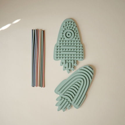 <tc>Mushie</tc> Juguete sensorial de silicona «Rocket»